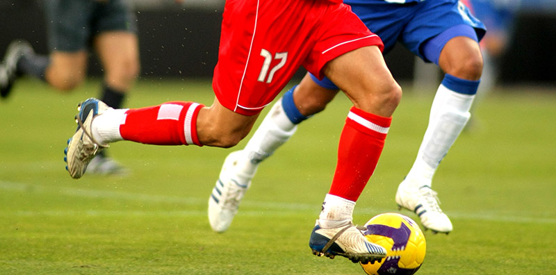 men playing soccer